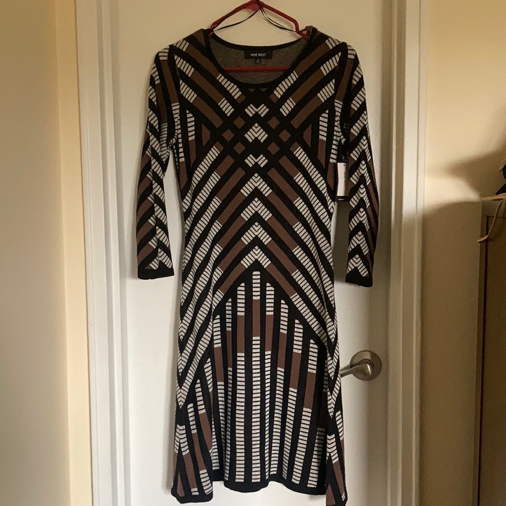 New with tags, Nine West knee length sweater dress.